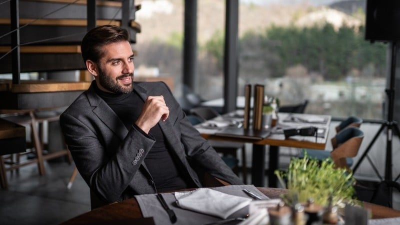 man at restaurant table