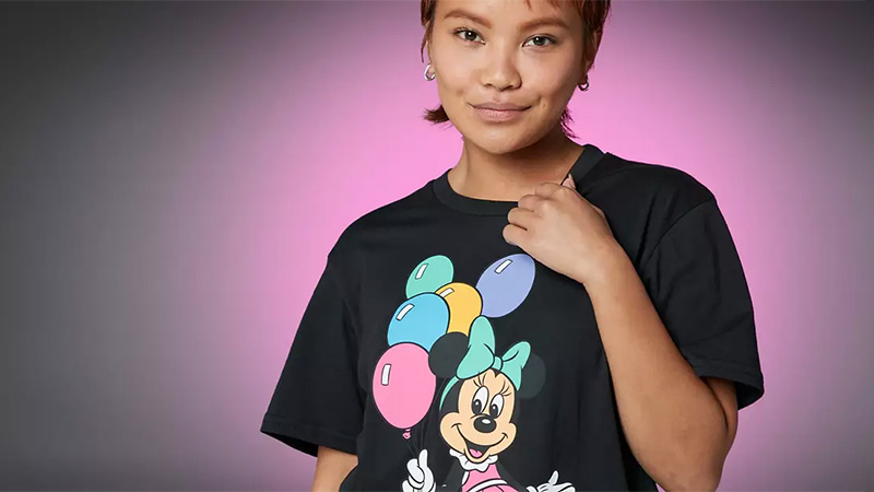 woman wearing a disney shop clothing item